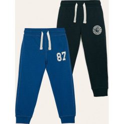 Blukids - Spodnie dziecięce 98-134 cm (2-pack). Niebieskie spodnie chłopięce Blukids, z nadrukiem, z bawełny, casualowe. W wyprzedaży za 59,90 zł.