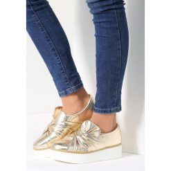 Złote Slip On By The Way. Żółte trampki damskie slip on vices. Za 49,99 zł.