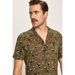 Jack & Jones - Koszula. Niebieskie koszule męskie Jack & Jones, xl, bez wzorów, z bawełny, klasyczne, z klasycznym kołnierzykiem, z krótkim rękawem. W wyprzedaży za 79,90 zł.