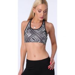 Top sportowy w geometryczne kształty biały MR15501. Białe topy sportowe damskie marki Fasardi, s, w geometryczne wzory. Za 39,00 zł.