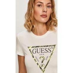 Guess Jeans - T-shirt. Żółte bluzki damskie Guess Jeans, s, z nadrukiem, z bawełny, casualowe, z okrągłym kołnierzem. Za 169,90 zł.