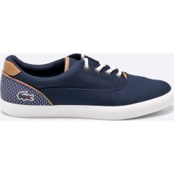 Lacoste - Tenisówki. Niebieskie tenisówki męskie marki Lacoste, z materiału, na sznurówki. W wyprzedaży za 299,90 zł.