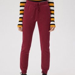 Spodnie jogger z wiązaniem w pasie - Bordowy. Czerwone spodnie damskie Sinsay, s. Za 29,99 zł.