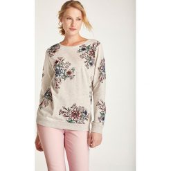 Bluza w kolorze beżowym ze wzorem. Brązowe bluzy damskie Heine, z nadrukiem. W wyprzedaży za 65,95 zł.