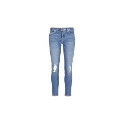 Jeansy slim fit Diesel BABHILA. Niebieskie jeansy damskie Diesel, bez wzorów, z jeansu. Za 443,40 zł.