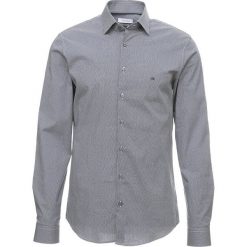Calvin Klein STRETCH SLIM FIT Koszula blue. Czarne koszule męskie slim marki Calvin Klein, z bawełny, z klasycznym kołnierzykiem, z długim rękawem. Za 359,00 zł.