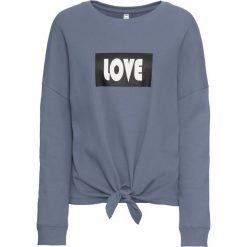 Bluza z ozdobnym przewiązaniem bonprix dymny szary - biały z nadrukiem. Szare bluzy damskie bonprix, z nadrukiem, bez rękawów, bez kaptura. Za 49,99 zł.