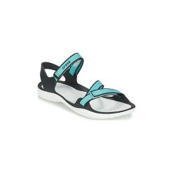 Sandały Crocs SWIFTWATER WEBBING SANDAL W. Niebieskie klapki damskie Crocs, bez wzorów, bez obcasa, bez zapięcia. Za 169,20 zł.