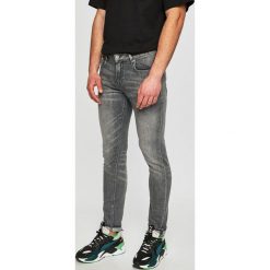 Scotch & Soda - Jeansy. Szare jeansy męskie marki Scotch & Soda, z aplikacjami. Za 499,90 zł.