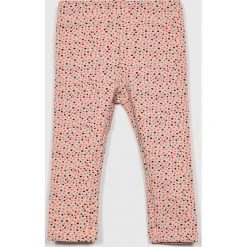 Name it - Legginsy dziecięce. Różowe spodnie dziewczęce Name it, bez wzorów, z elastanu. W wyprzedaży za 37,90 zł.