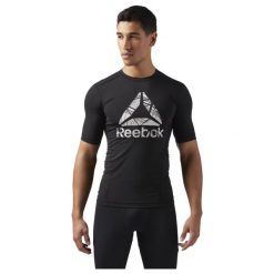 KOSZULKA REEBOK COMMERCIAL CHANNEL COMPRESSION SS CE3864. Czarne koszulki męskie marki Reebok, m, bez wzorów, bez kołnierzyka, bez rękawów. Za 69,00 zł.