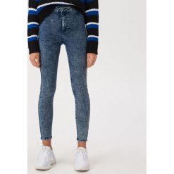 Jeansy skinny z efektem sprania - Granatowy. Niebieskie jeansy damskie Sinsay, bez wzorów, z jeansu. Za 59,99 zł.