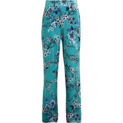 Bryczesy damskie: Gestuz OCEAN PANTS Spodnie treningowe blue