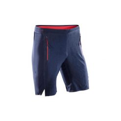 Spodenki fitness kardio FST 900 męskie. Niebieskie spodenki sportowe męskie marki DOMYOS, m, bez wzorów, z elastanu, na fitness i siłownię. Za 99,99 zł.