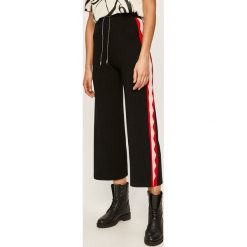 Desigual - Spodnie. Czarne spodnie damskie Desigual, s, z poliesteru. Za 399,90 zł.