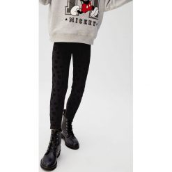 Mango Kids - Legginsy dziecięce Romani 110-164 cm. Czarne spodnie dziewczęce Mango Kids, bez wzorów, z elastanu. Za 69,90 zł.