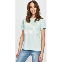 Puma - Top. Zielone bluzki damskie Puma, s, z nadrukiem, z elastanu, z okrągłym kołnierzem. W wyprzedaży za 89,90 zł.