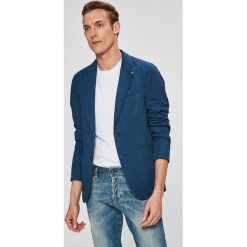 Tommy Hilfiger - Marynarka. Niebieskie garnitury męskie marki TOMMY HILFIGER, z bawełny, casualowe. W wyprzedaży za 799,90 zł.