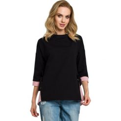 Bluzka - czarna. Czarne bluzki damskie Moe, s, bez wzorów, z elastanu, z koszulowym kołnierzykiem, bez rękawów. Za 169,00 zł.