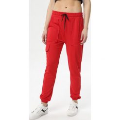 Czerwone Spodnie Mirama. Czerwone spodnie damskie Born2be, s, bez wzorów, z dzianiny. Za 59,99 zł.