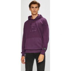 Puma - Bluza. Fioletowe bluzy męskie Puma, m, z nadrukiem, z elastanu, z kapturem, bez rękawów, z kapturem. W wyprzedaży za 239,90 zł.