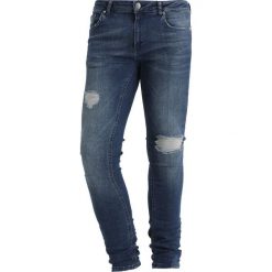 Jeansy męskie: Criminal Damage SPRAY Jeans Skinny Fit medium blue
