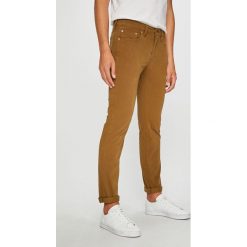 Levi's - Jeansy 511. Brązowe jeansy męskie regular Levi's®, z aplikacjami, z bawełny. Za 329,90 zł.