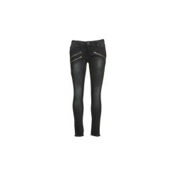 Jeansy slim fit Volcom ROCK OUT. Czarne jeansy damskie marki Volcom, bez wzorów, z jeansu. Za 391,20 zł.