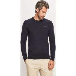 Calvin Klein Jeans - Sweter. Niebieskie swetry męskie Calvin Klein Jeans, s, z aplikacjami, z elastanu, z okrągłym kołnierzem, bez kaptura. Za 359,90 zł.