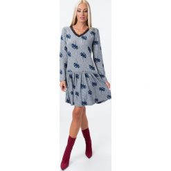Sukienka z koronką we wzory niebieska 15070. Niebieskie sukienki damskie Fasardi, xl, w koronkowe wzory, z koronki, bez kołnierzyka, bez rękawów. Za 54,00 zł.