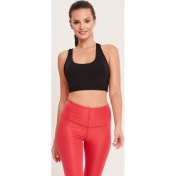 Cardio Bunny - Biustonosz sportowy Goa. Różowe biustonosze sportowe damskie Cardio Bunny, s, bez wzorów, z elastanu. W wyprzedaży za 119,90 zł.