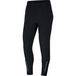 Spodnie Nike Swift Trousers W Czarne. Czarne spodnie damskie Nike, s, bez wzorów, z materiału, do biegania, dri-fit (nike). Za 239,99 zł.