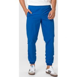 Adidas Originals Big Trefoil Spodnie dresowe Niebieski. Niebieskie spodnie męskie adidas Originals, xl, bez wzorów, z poliesteru. Za 266,95 zł.