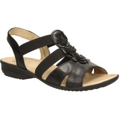 Sandały caprice 9-28652-24. Czarne sandały damskie Caprice, bez wzorów, ze skóry, eleganckie, bez obcasa, bez zapięcia. Za 249,99 zł.