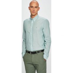 Calvin Klein - Koszula. Białe koszule męskie Calvin Klein, xl, bez wzorów, z bawełny, casualowe, button down, z długim rękawem. W wyprzedaży za 199,90 zł.