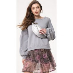 Brązowa Spódnica Revealing. Pomarańczowe spódniczki damskie Born2be, xl, w kwiaty, mini. Za 29,99 zł.