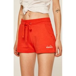 Diadora - Szorty. Czerwone spodenki sportowe damskie Diadora, s, bez wzorów, z bawełny, sportowe. Za 99,90 zł.
