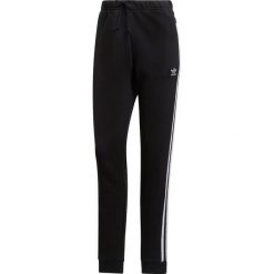 Spodnie adidas Regular TP Cuf (DV2572). Czarne spodnie damskie marki Adidas, z bawełny. Za 249,99 zł.