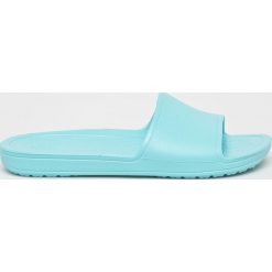Crocs - Klapki. Fioletowe klapki damskie Crocs, bez wzorów, z materiału, bez obcasa, na obcasie. W wyprzedaży za 89,90 zł.