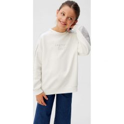 Mango Kids - Bluza dziecięca Plata 110 - 164 cm. Bluzy dziewczęce Mango Kids, z nadrukiem, z bawełny, bez rękawów, bez kaptura. Za 79,90 zł.