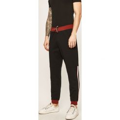 Armani Exchange - Spodnie. Czarne spodnie męskie Armani Exchange, xl, bez wzorów, z elastanu. Za 499,90 zł.