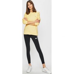 New Balance - Legginsy. Czarne spodnie damskie New Balance, s, bez wzorów, z elastanu. W wyprzedaży za 129,90 zł.