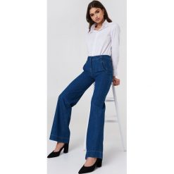 Spodnie damskie: Trendyol Jeansy dzwony z wysokim stanem - Blue