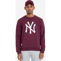 New Era - Bluza. Brązowe bluzy męskie New Era, xl, z nadrukiem, z bawełny, z okrągłym kołnierzem, bez rękawów, bez kaptura. W wyprzedaży za 199,90 zł.