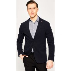 Marynarka Tommy Hilfiger Tailored Jersey Flex Blazer TT0TT06690. Niebieskie marynarki męskie Tommy Hilfiger Tailored, m, bez wzorów, z bawełny, casualowe. W wyprzedaży za 849,00 zł.