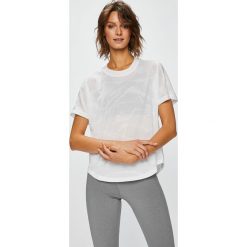 Adidas Performance - Top. Białe topy sportowe damskie marki adidas Performance, s, z poliesteru, z okrągłym kołnierzem. W wyprzedaży za 119,90 zł.