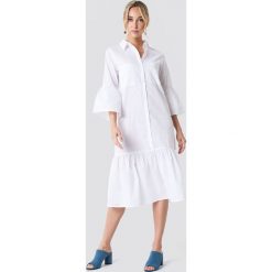 NA-KD Boho Sukienka koszulowa z bufiastym rękawem - White. Białe sukienki damskie NA-KD Boho, bez wzorów, boho, z falbankami, z krótkim rękawem, krótkie, midi, koszulowe. Za 121,95 zł.