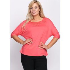 Koralowa Bluzka Arcane. Pomarańczowe bluzki damskie Born2be, xl, bez wzorów, z dzianiny, bez kołnierzyka, bez rękawów. Za 49,99 zł.