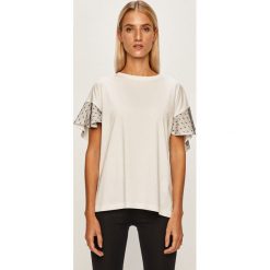Red Valentino - T-shirt. Czarne bluzki damskie Red Valentino, s, bez wzorów, z bawełny, casualowe, z okrągłym kołnierzem, z krótkim rękawem. Za 849,90 zł.