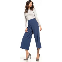Granatowe Materiałowe Spodnie Kuloty 7/8. Niebieskie spodnie damskie Molly.pl, s, bez wzorów, z tkaniny, eleganckie. Za 148,90 zł.